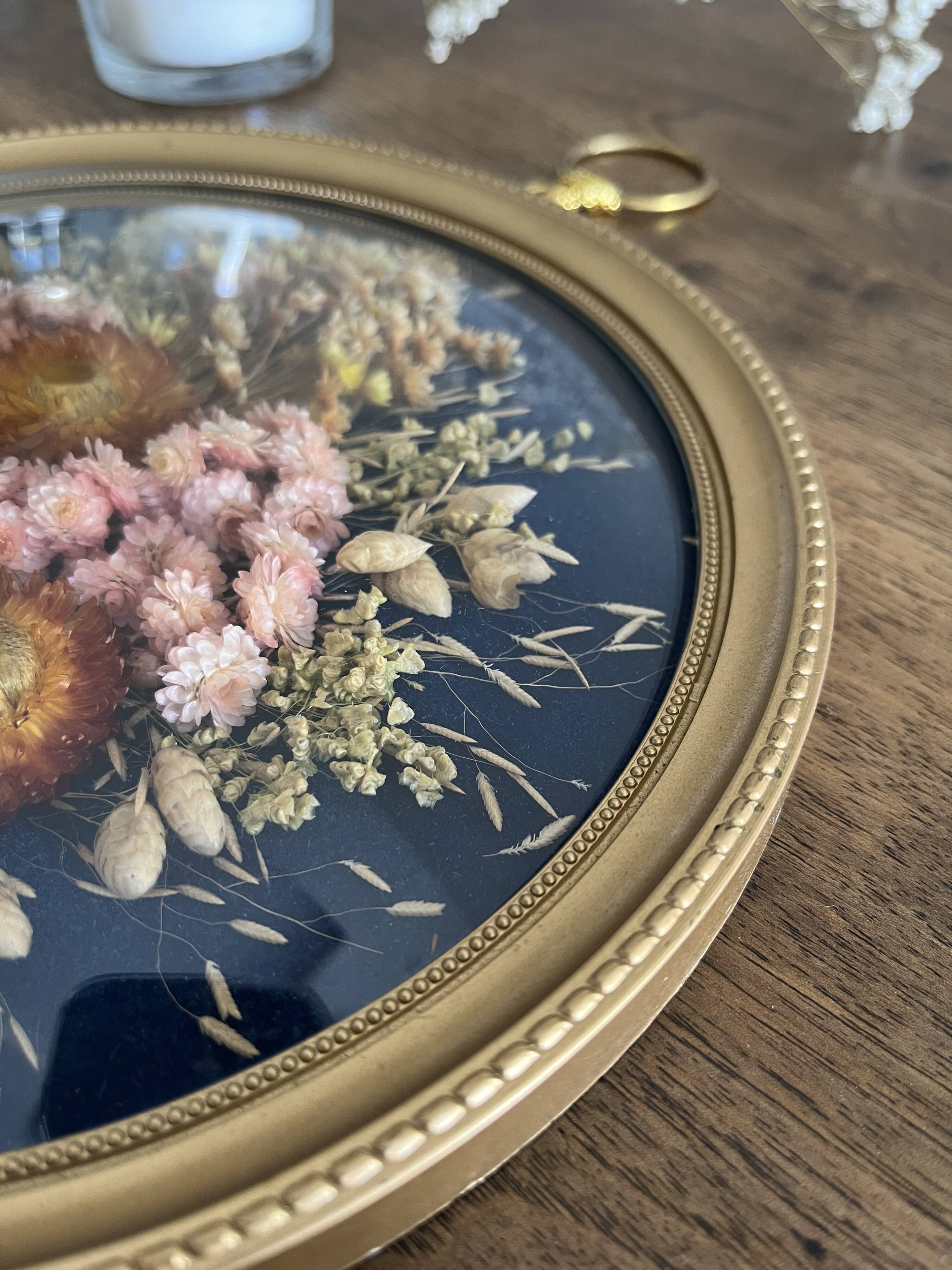 Cadre rond verre bombé fleurs séchées