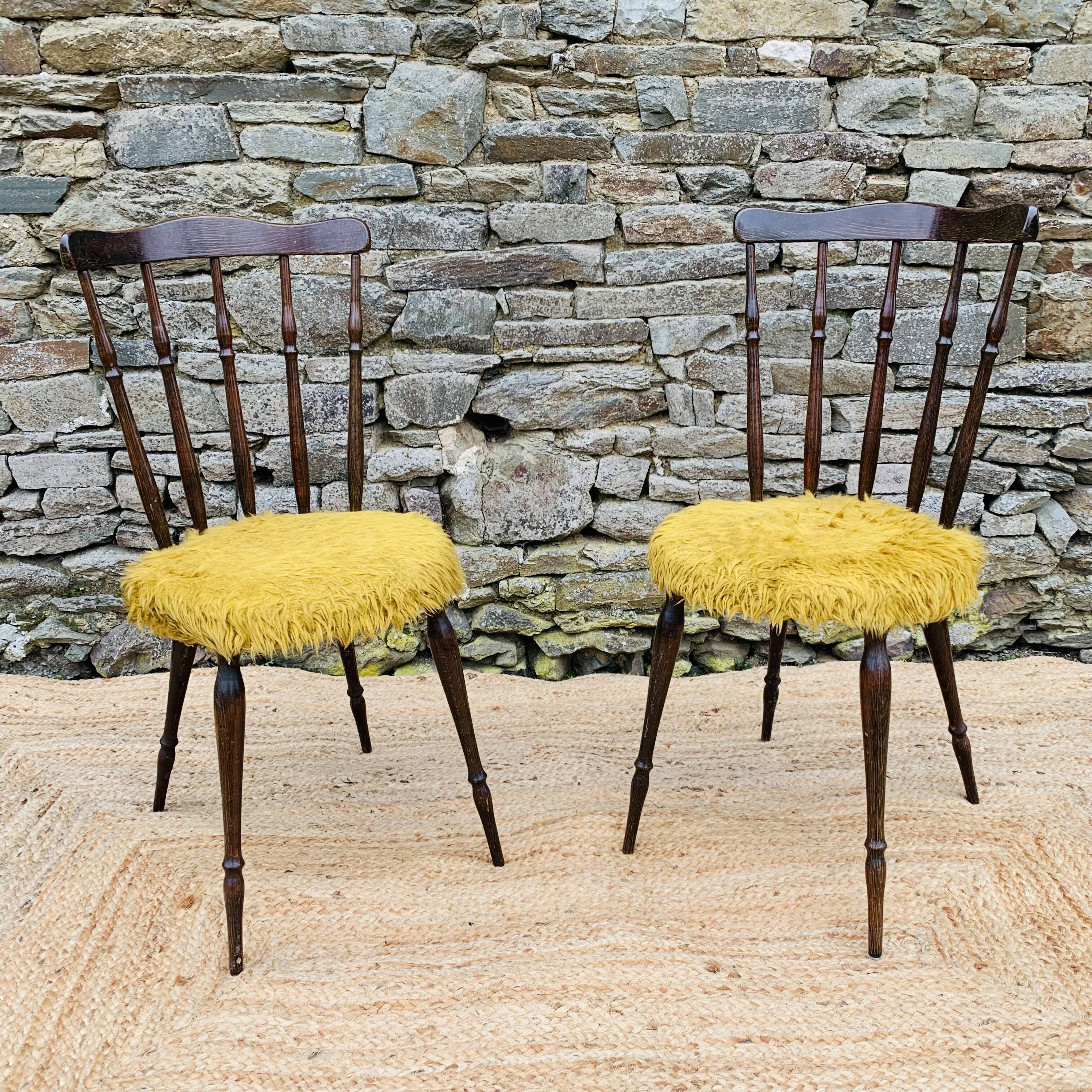 Pair of yellow moumoute chairs