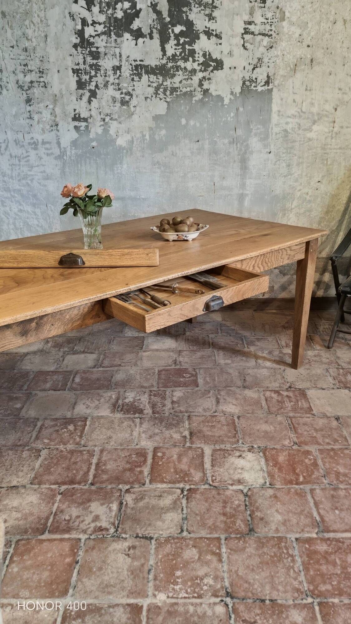Large authentic farmhouse table made of solid French oak.