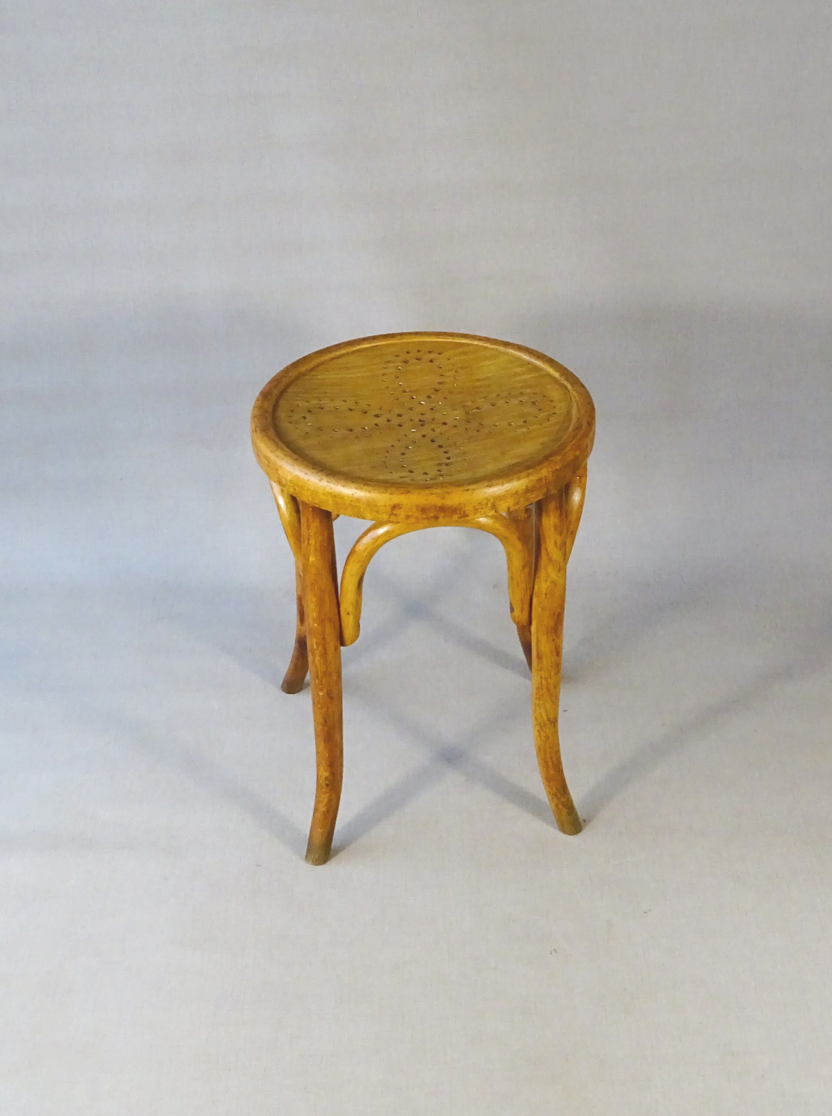 Curved wood bistro stool perforated seat 1920