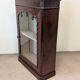 Mahogany display cabinet from the late 19th century, for standing or wall mounting.