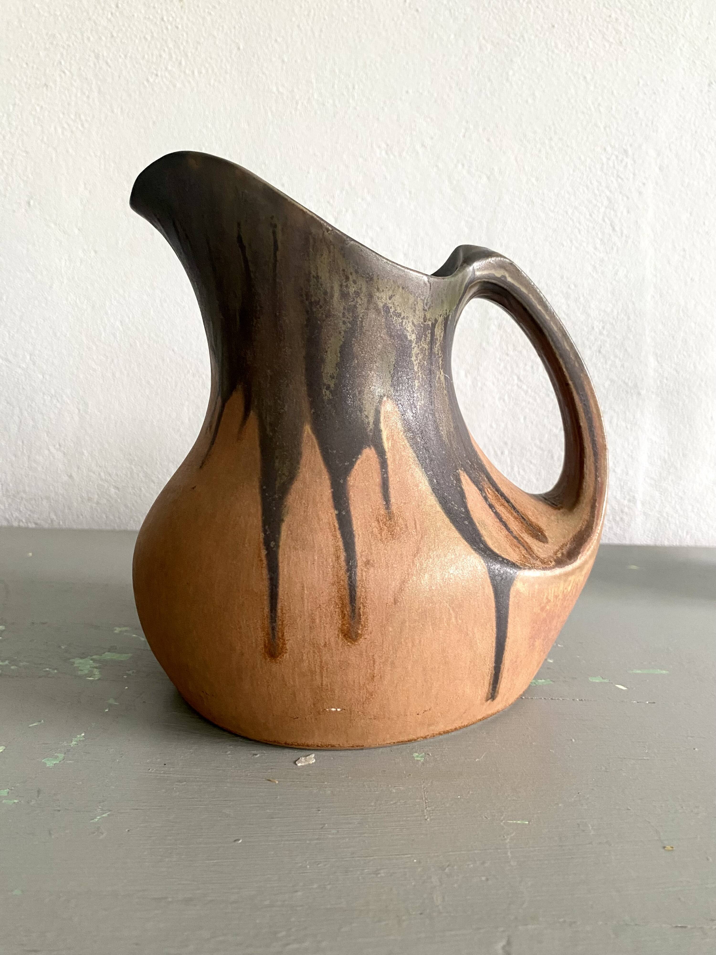 Denbac pitcher, flamed terracotta, 1900
