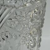 Glass vase with stylized flower pattern