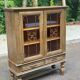 Spanish Renaissance display case in patinated solid wood