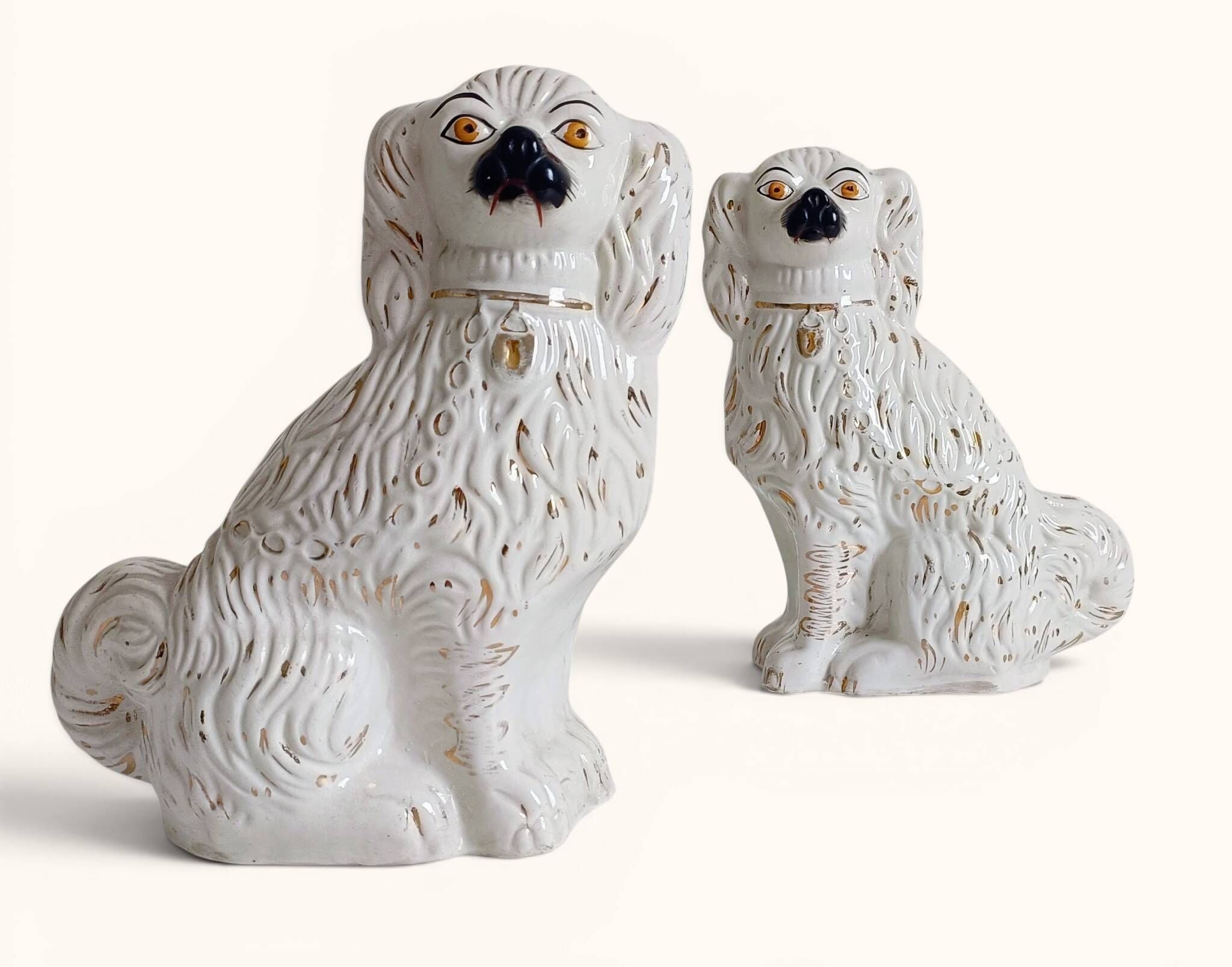 Pair of King Charles Spaniel dogs in Staffordshire majolica style.