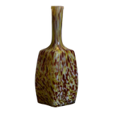 Yellow and white speckled decanter