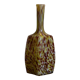 Yellow and white speckled decanter