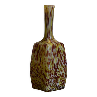 Yellow and white speckled decanter