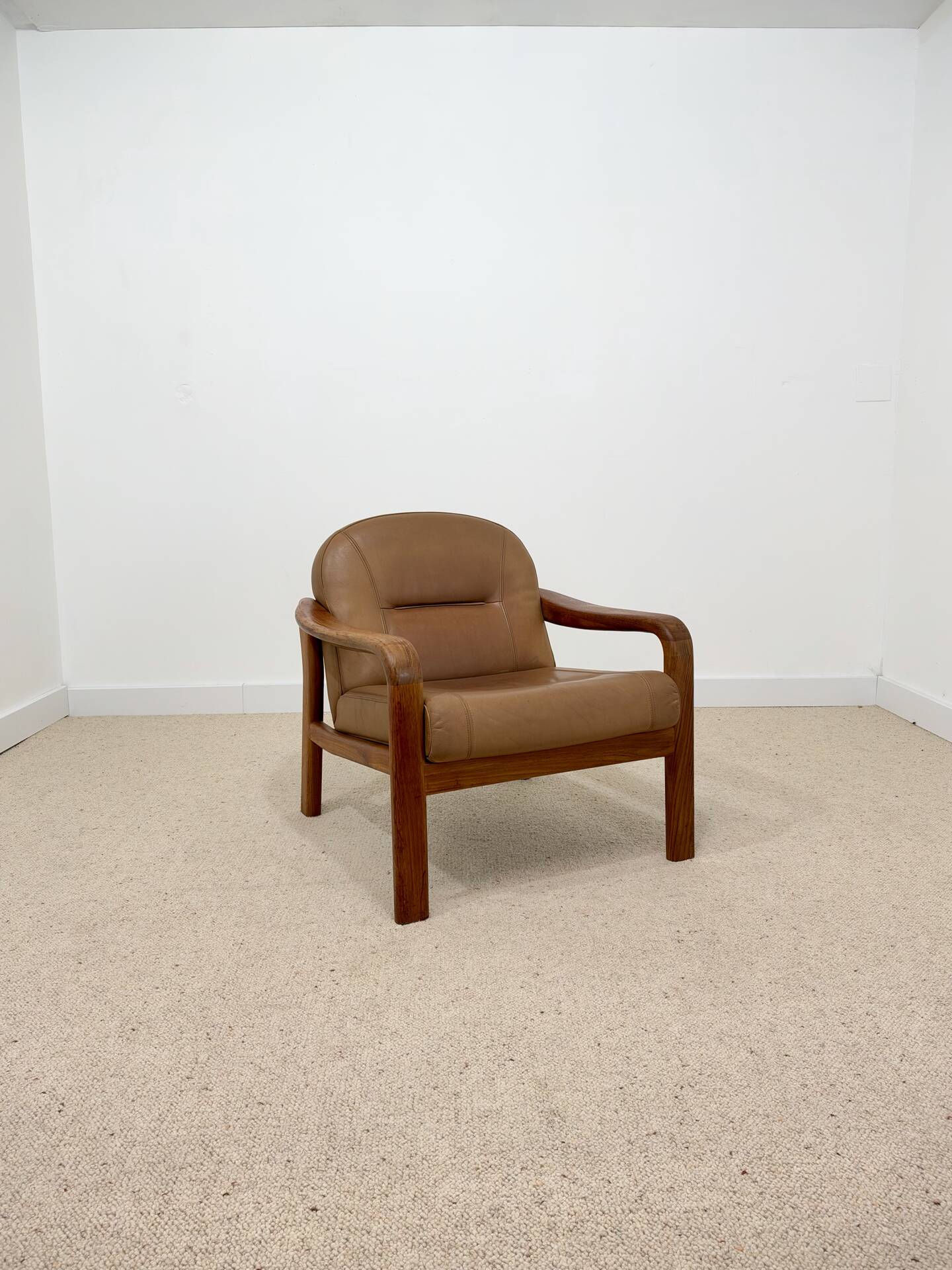Vintage leather and wood armchair – 1970s