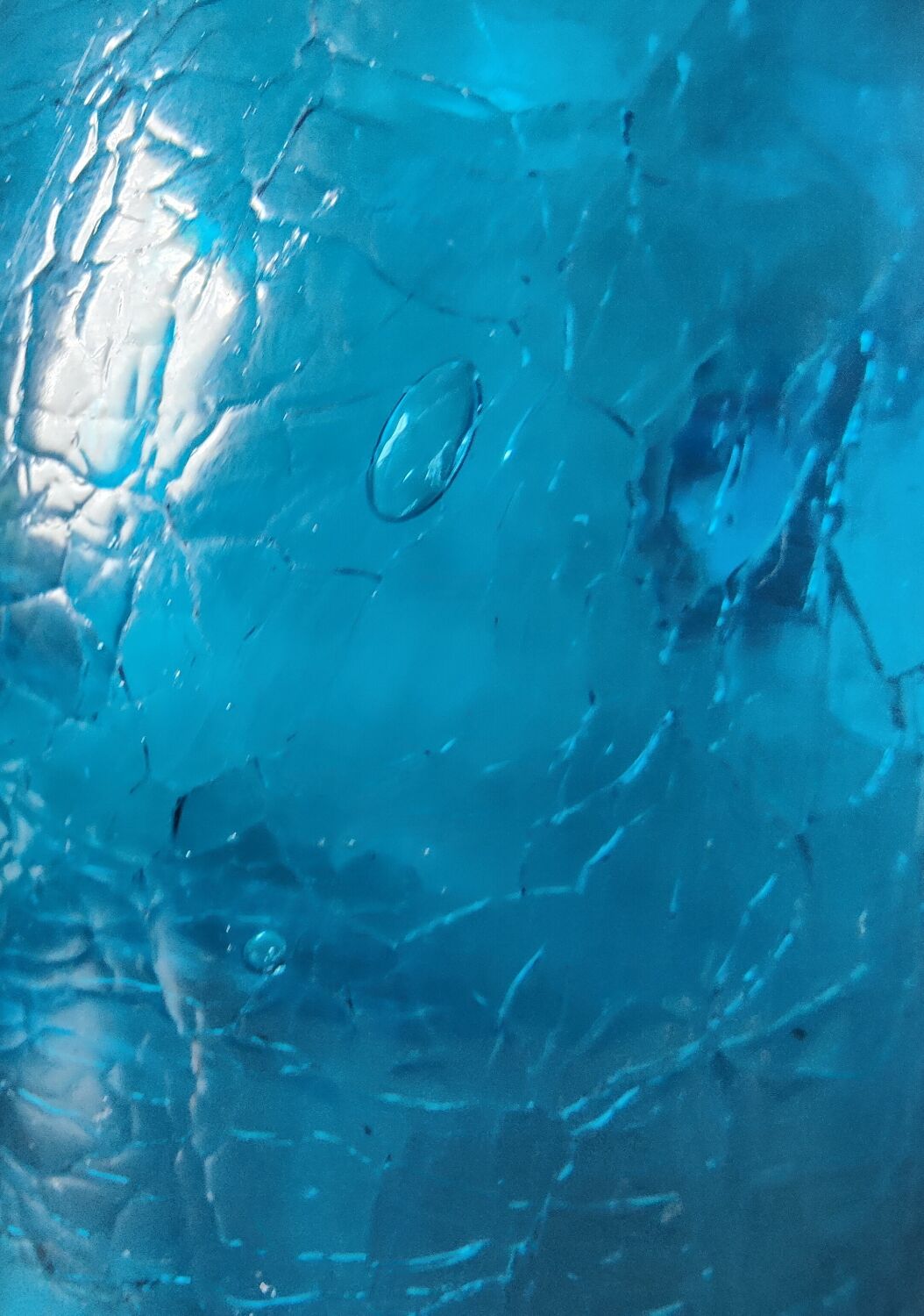 Blue cracked glass pitcher