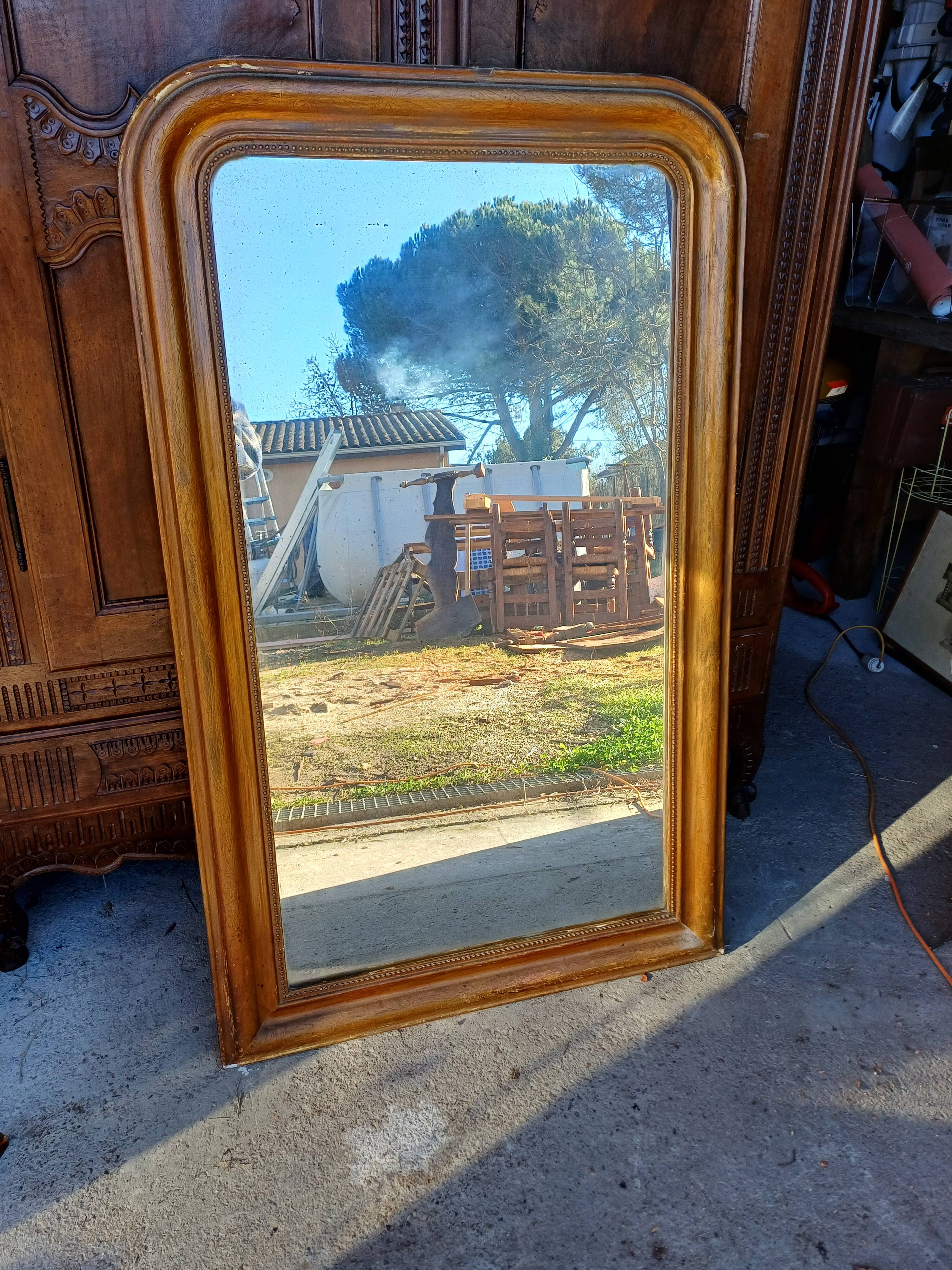 Napoleon III mirror in wood and gilded stucco