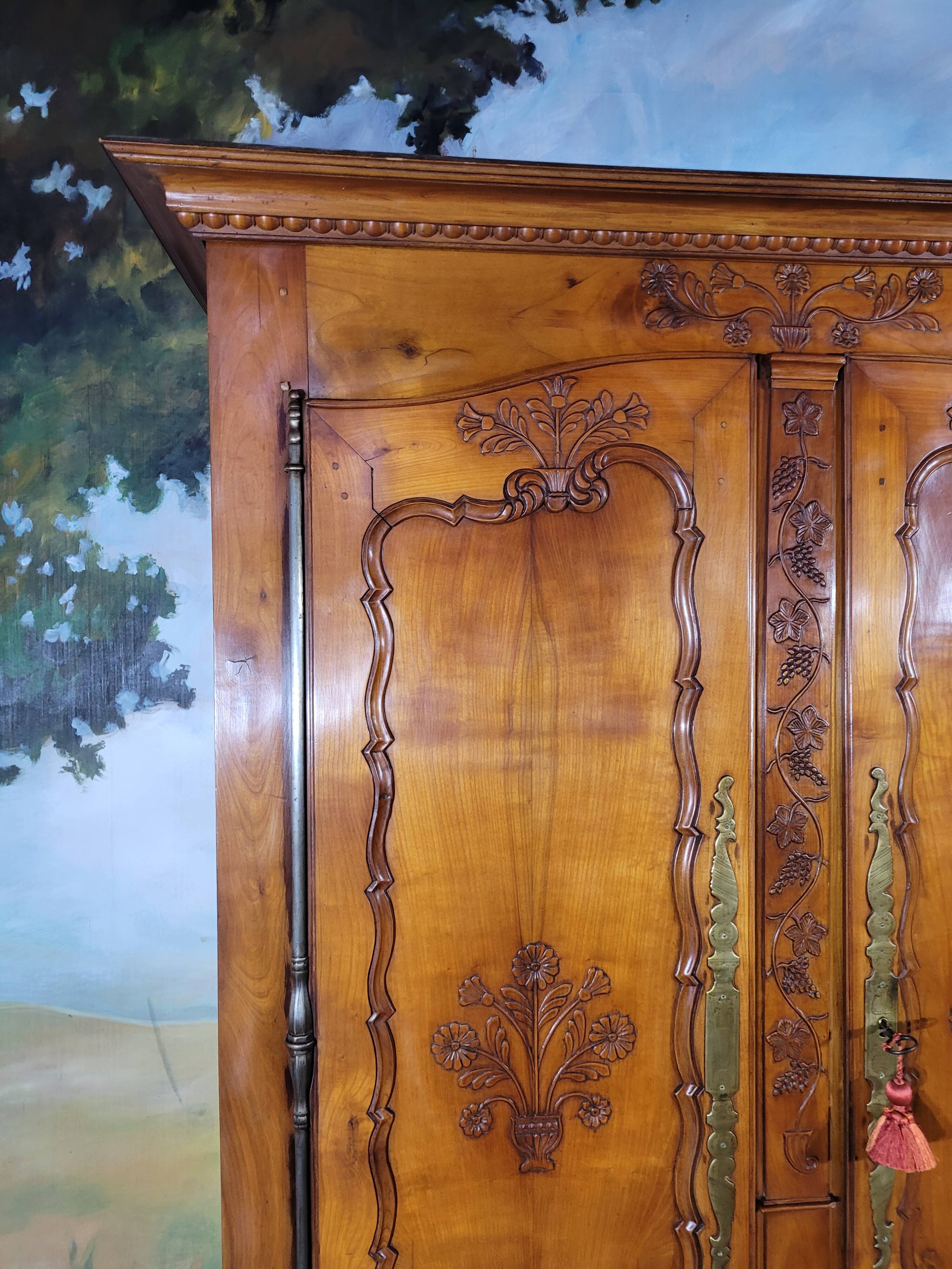 Louis XV style carved cherry wood armoire