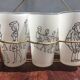 Set of glasses drawn by Cabù