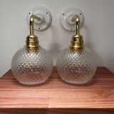 Pair of chiseled glass wall sconces