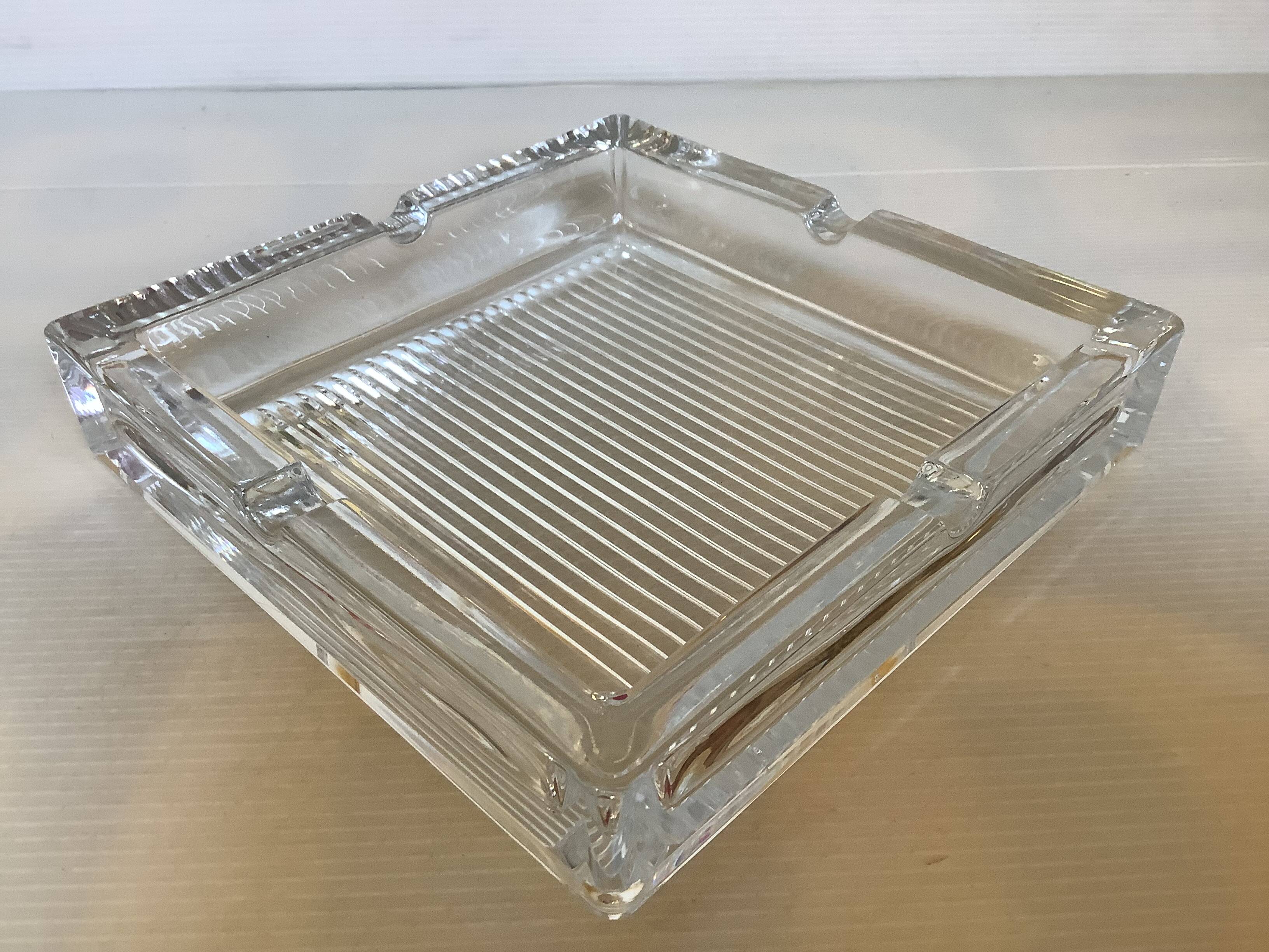 Large crystal ashtray and pocket tray.
