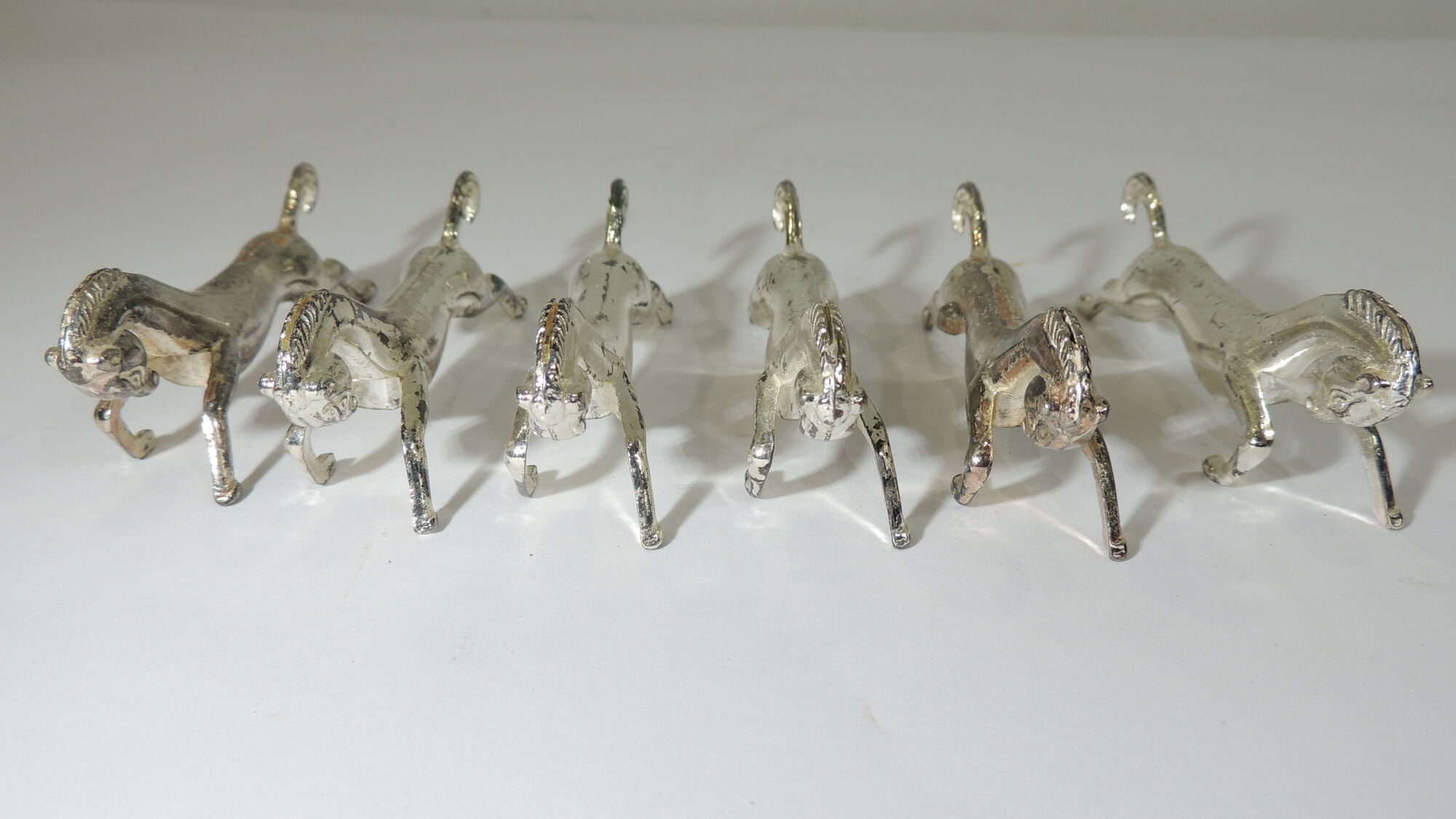 Lot 17 porte couteaux métal /chien /cheveaux/vintage