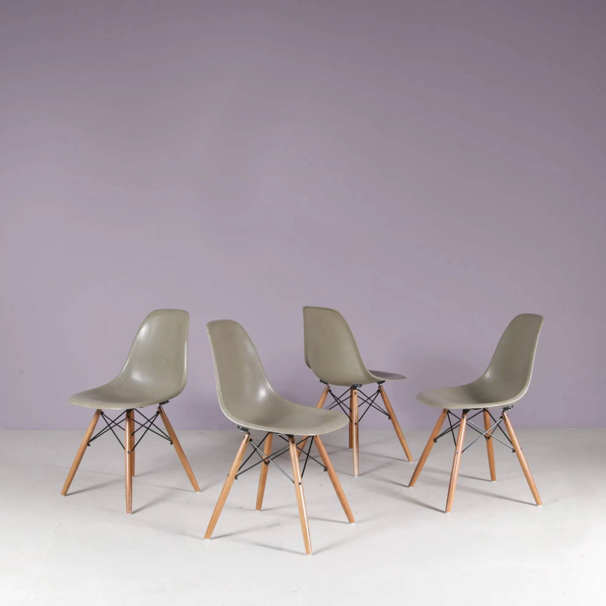 1960s set of 4 dining chairs in “sea foam” green fiberglass / Charles & Ray Eames / Herman Miller, USA