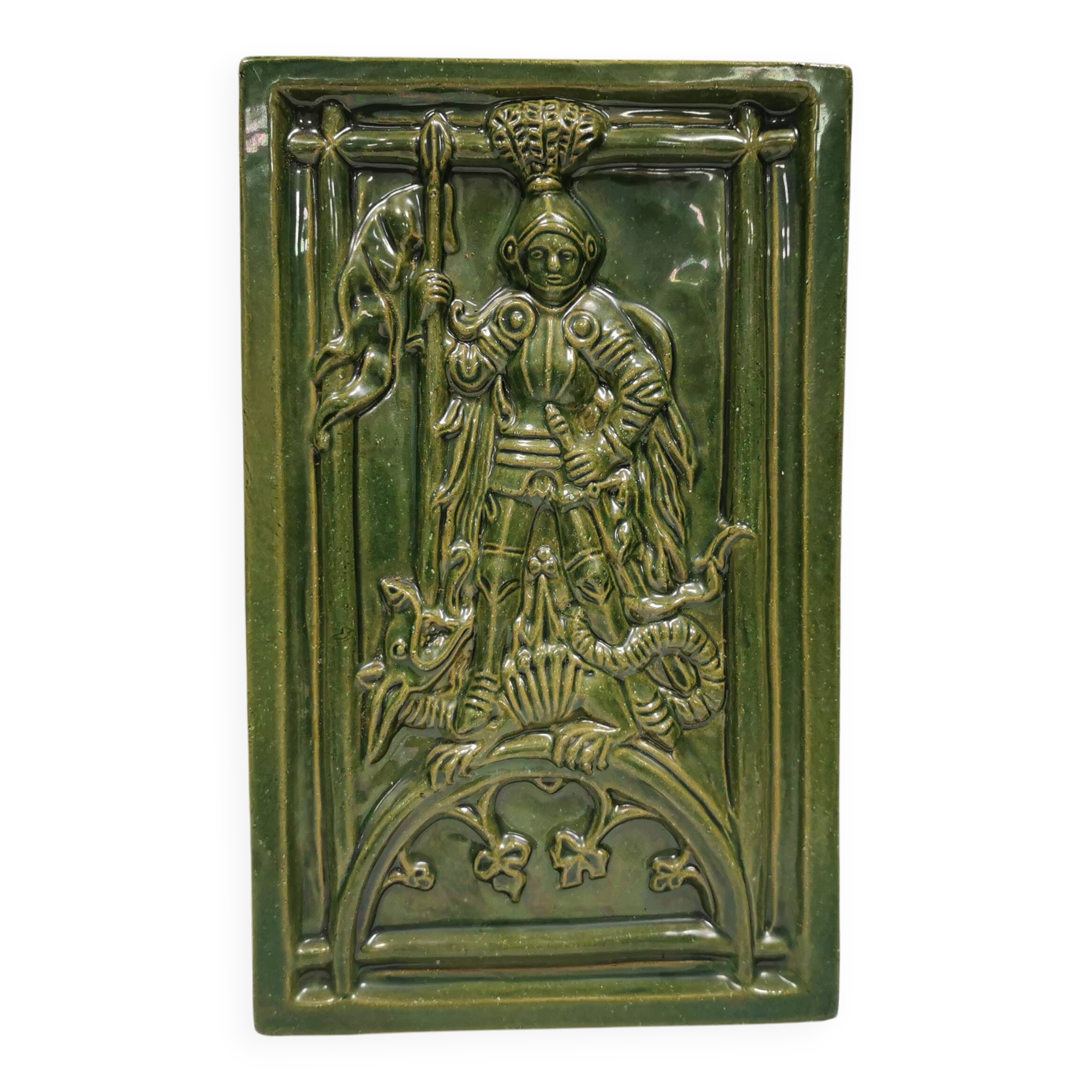 Antique tile in green faience, motif of Saint George and the dragon