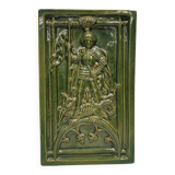 Antique tile in green faience, motif of Saint George and the dragon