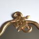 Gilded mirror with bird by Edouard Rambaud, 1990s