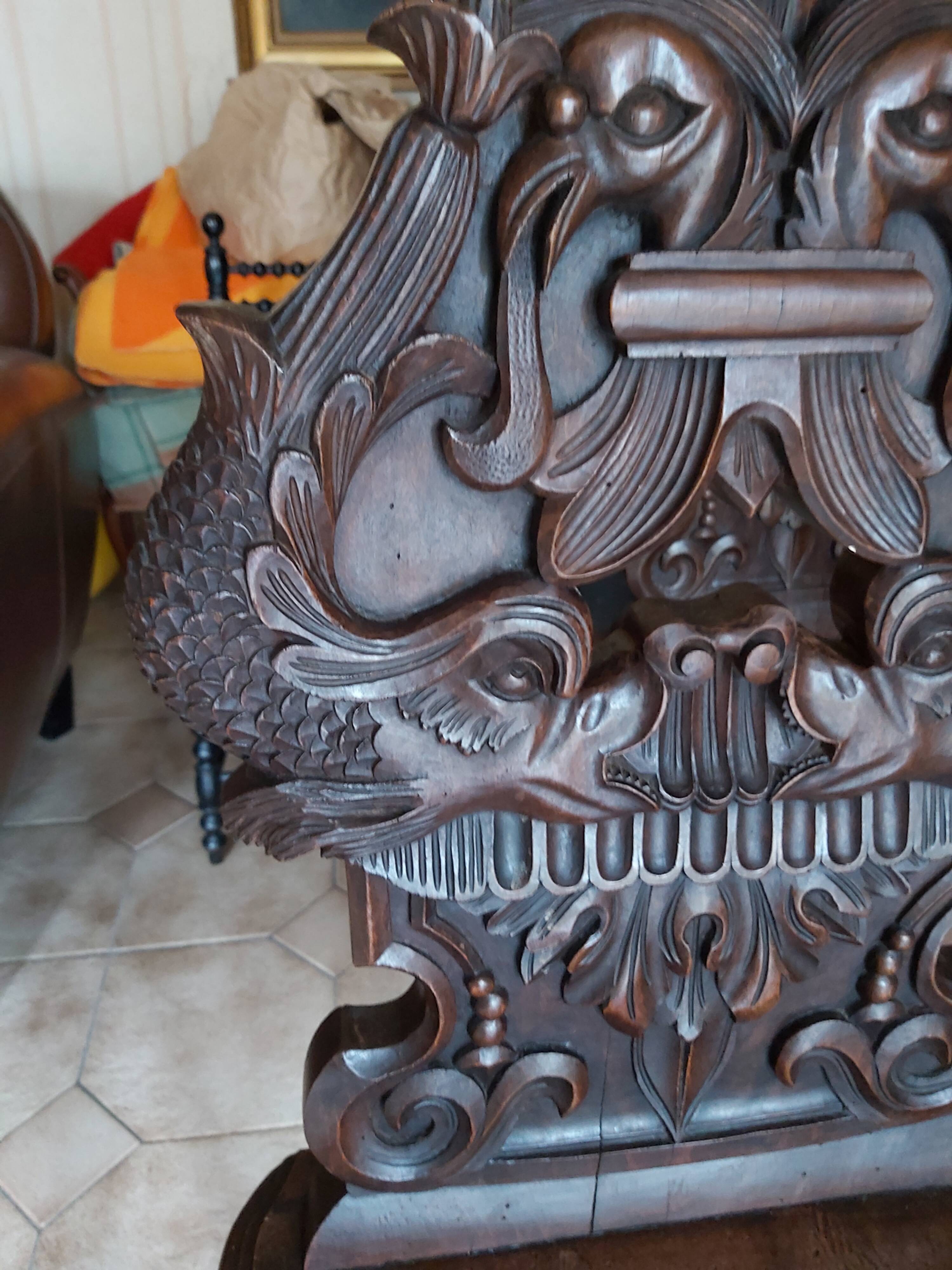 4 stylized dolphin back chairs