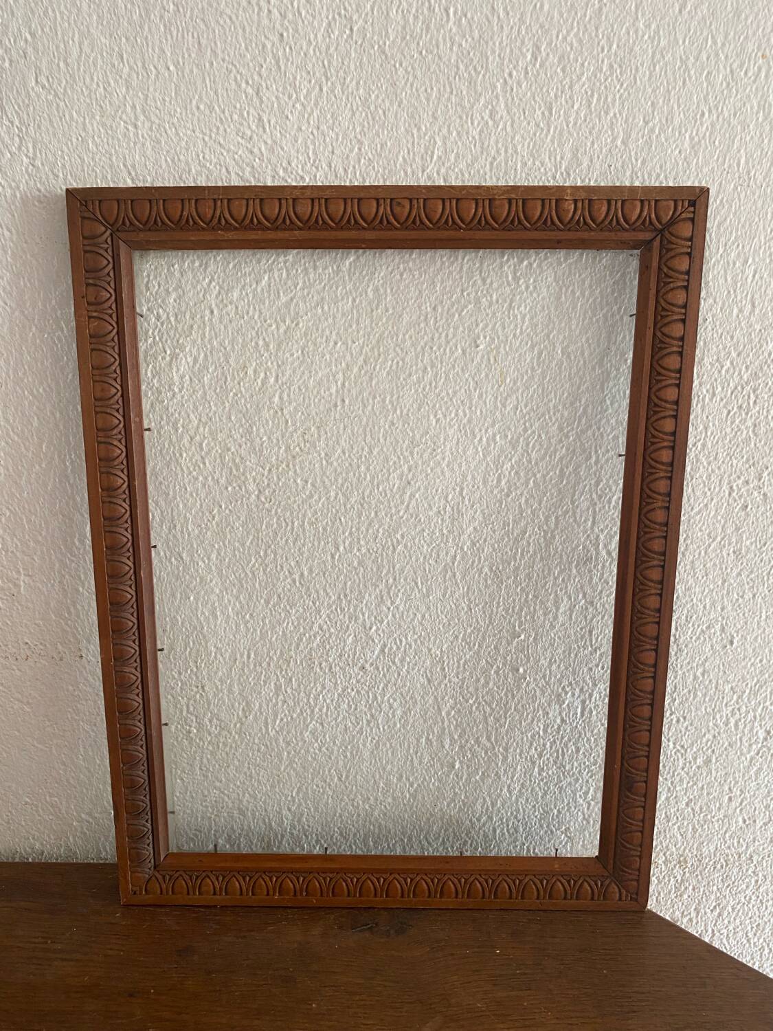 Carved wooden frame circa 1930.