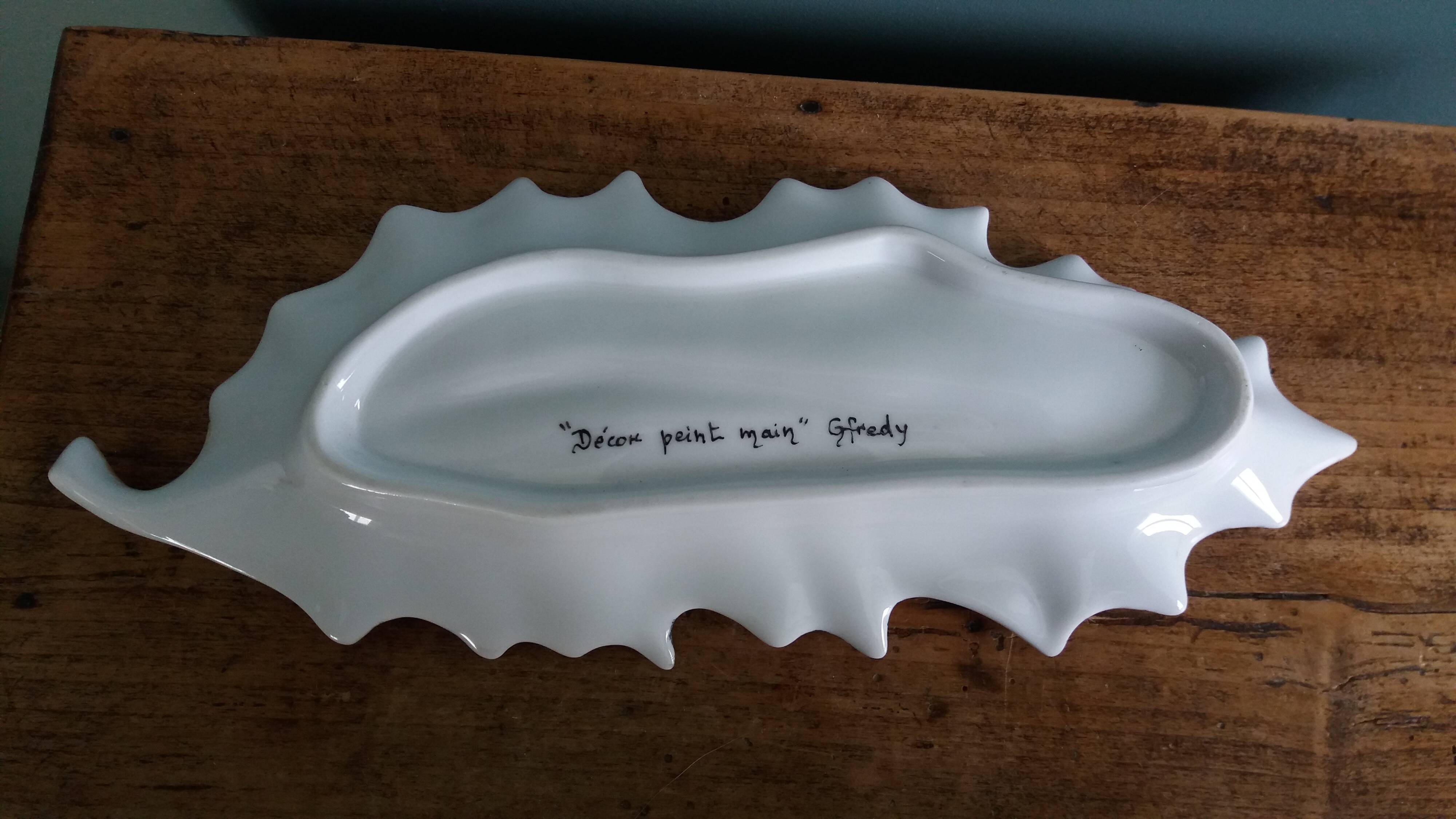 Iridescent enamelled leaf catchall, signed Gfredy.