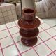 Colorful burgundy red designer candlestick holder