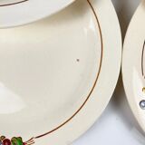 Set of 10 flat plates Longwy, 20th century, floral decoration.