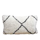 Bohemian wool pillow cover on a Beni Ourain Berber cushion. The cushion cover