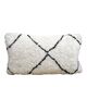 Bohemian wool pillow cover on a Beni Ourain Berber cushion. The cushion cover