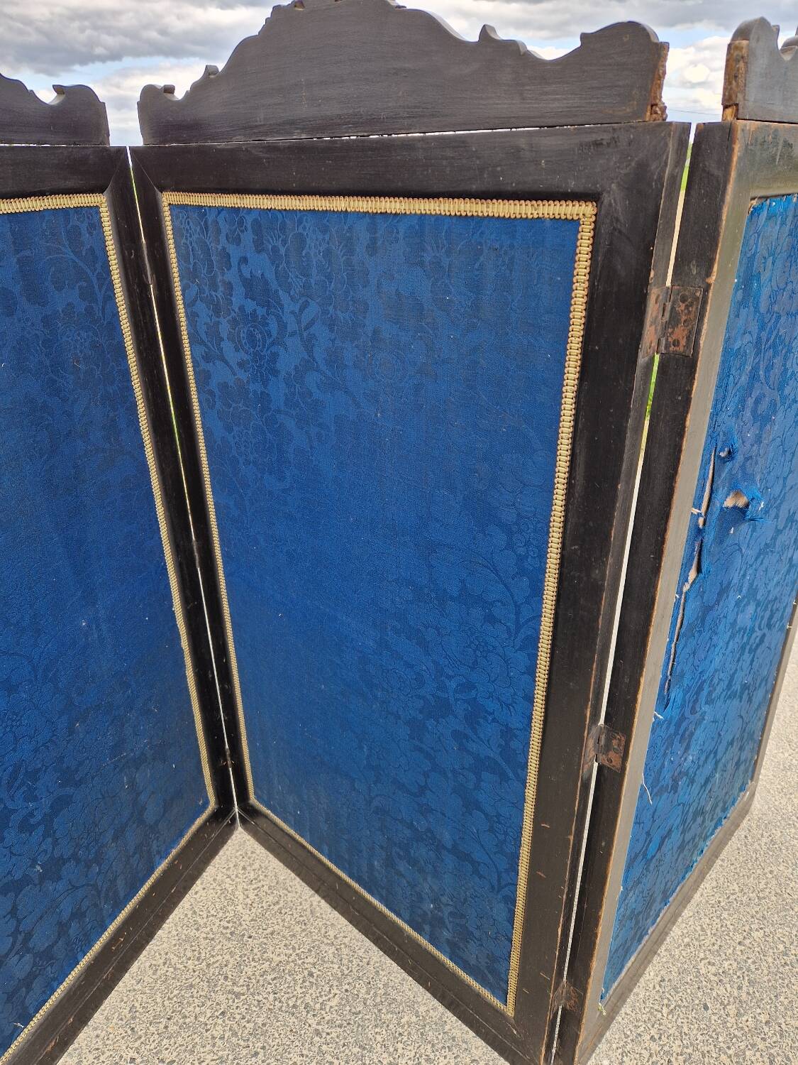 Folding screen in black-painted wood, 19th century