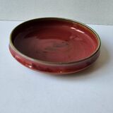 Red enamelled ceramic bowl emptier by Alain Déjardin