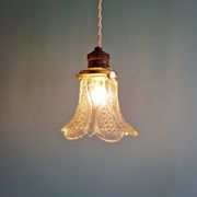 Art Deco trio of pendant lights/table lamps in clear glass, 1920s-30s.