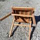 Compass leg armchair