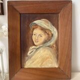 Old oil portrait on wood of a young woman
