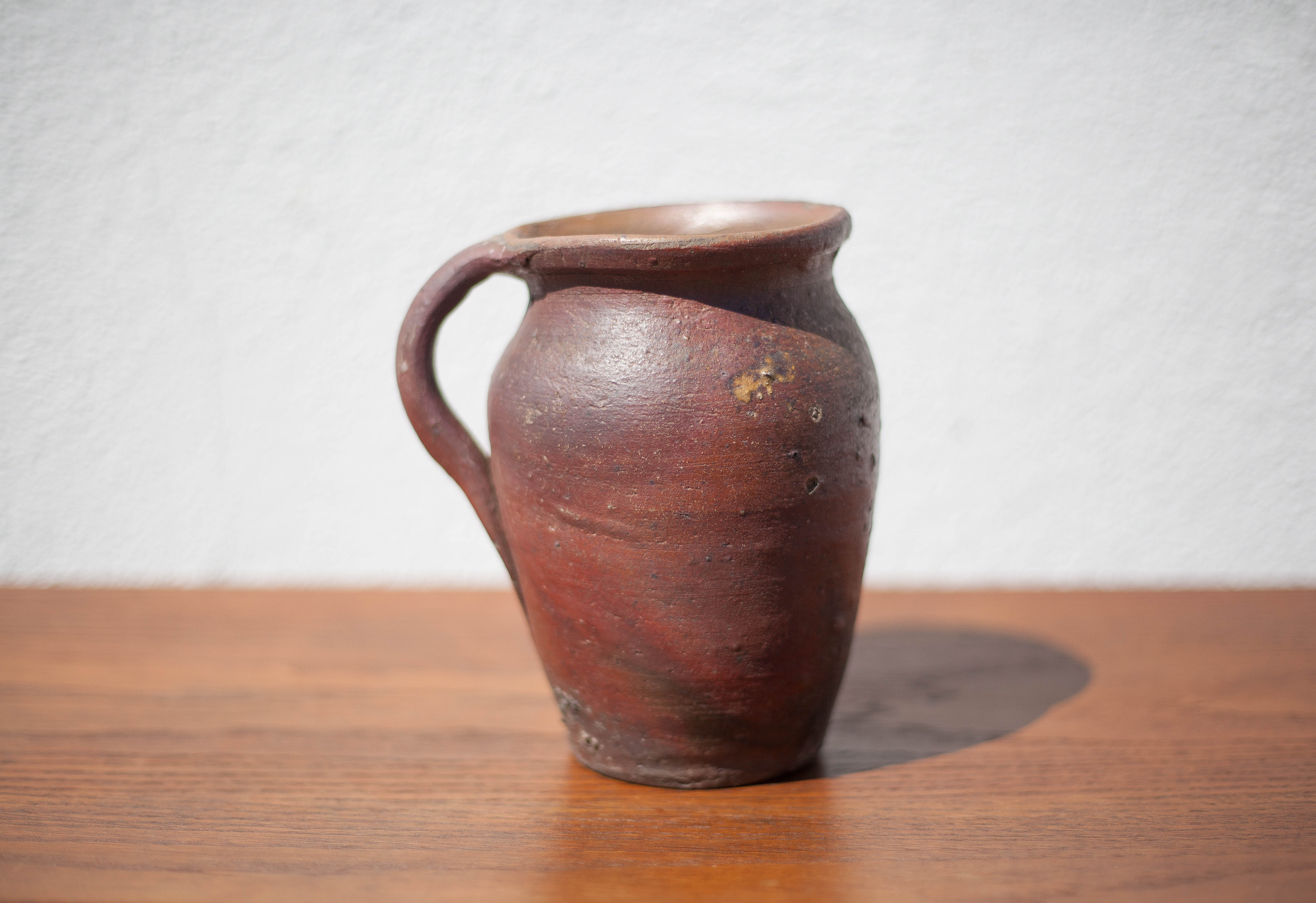 Pot in Norman sandstone of Ger