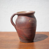 Pot in Norman sandstone of Ger