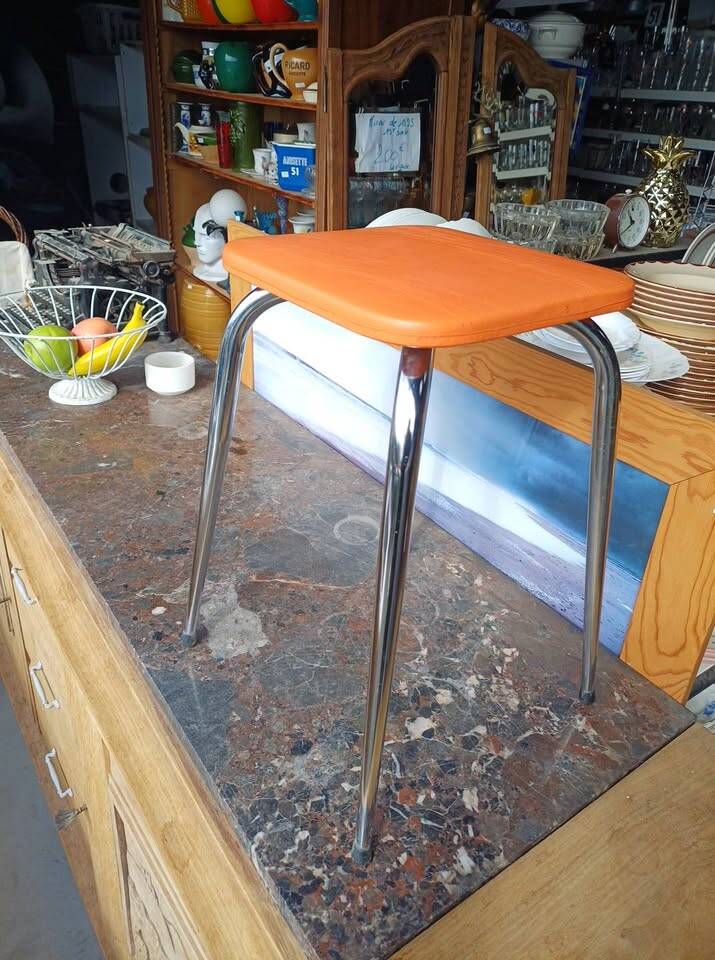 Orange leatherette stool from the 60s/70s