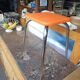 Orange leatherette stool from the 60s/70s