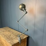 Dark grey Jielde three-arm clamp table lamp