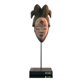 Punu mask on a base