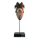 Punu mask on a base