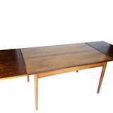 Dining table in rosewood with extensions of danish design from the 1960s