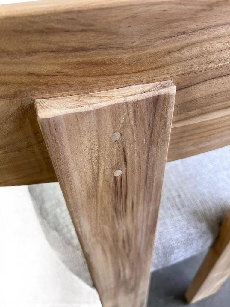 Solid wood chair with a linen-look seat.