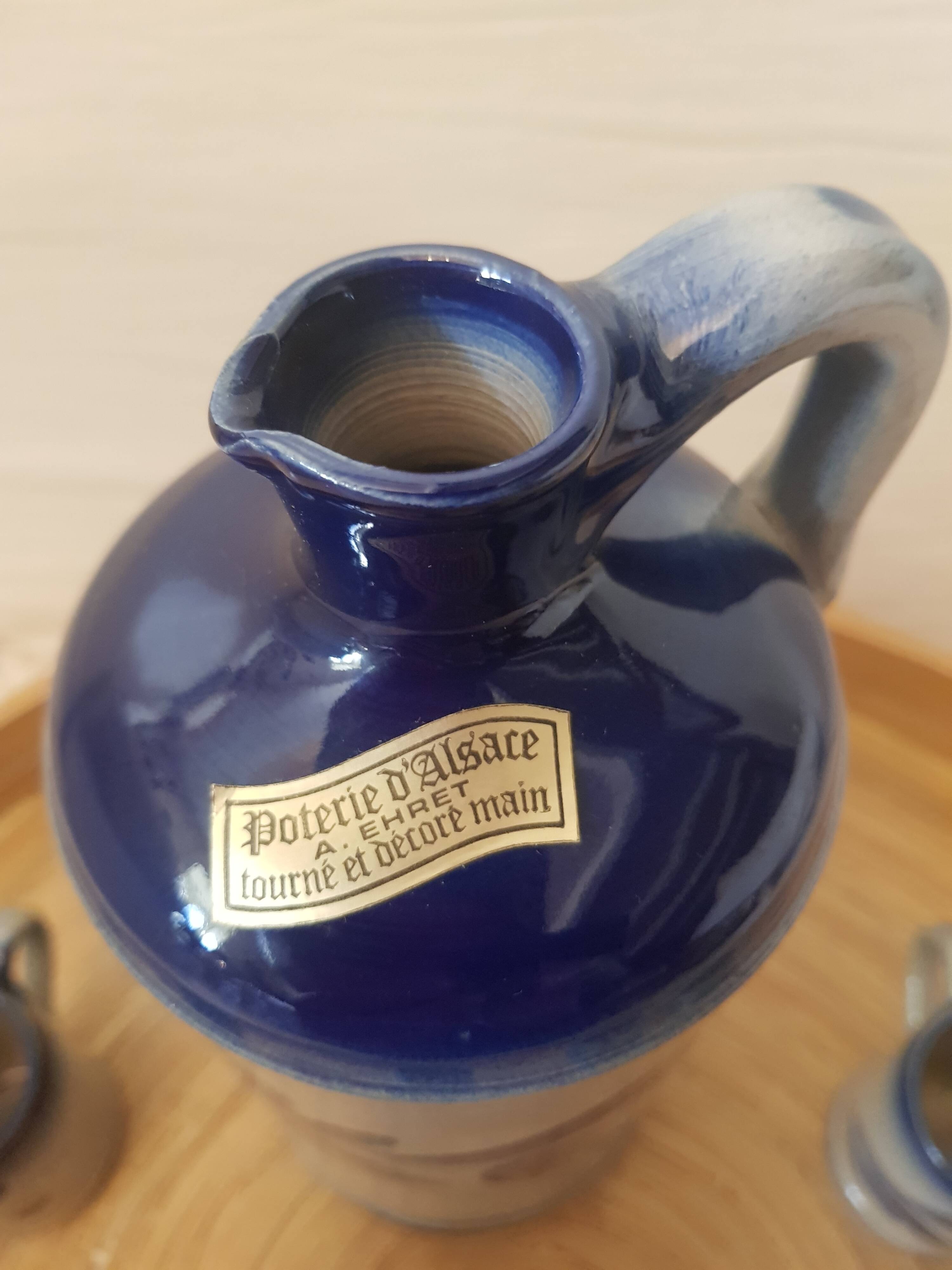 Pitcher and 8 mugs signed Anne Ehret in Alsace stoneware