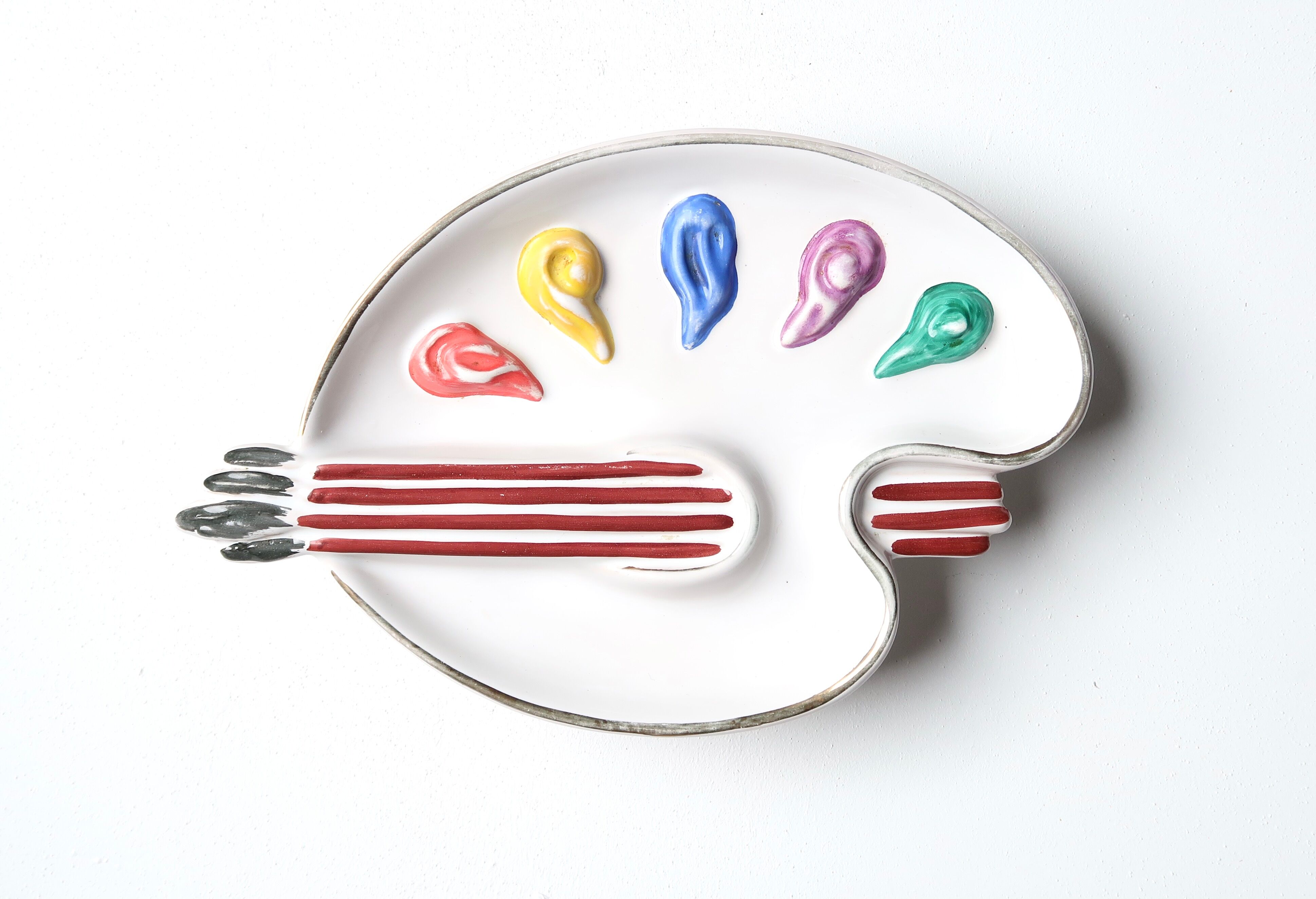 Empty pocket ceramic paint palette, 50s