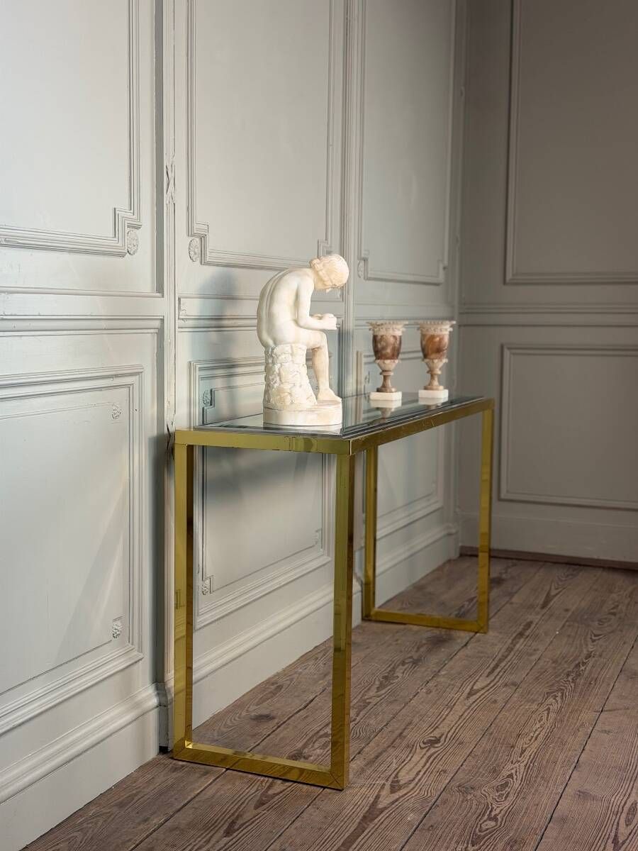 Golden and chrome metal console, bevelled glass, circa 1980.