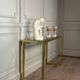 Golden and chrome metal console, bevelled glass, circa 1980.