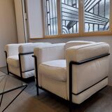 A sofa and two LC2 Cassina armchairs